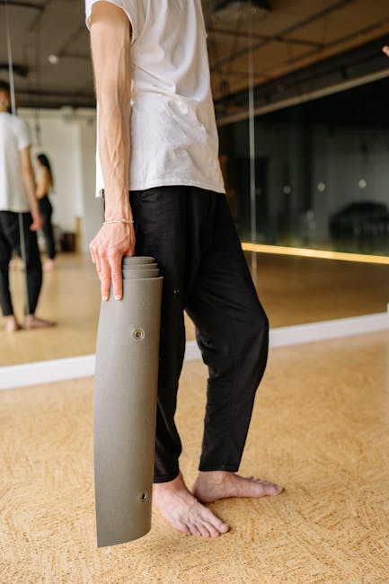 Person holding a stable yoga pose, demonstrating calm strength and balance.