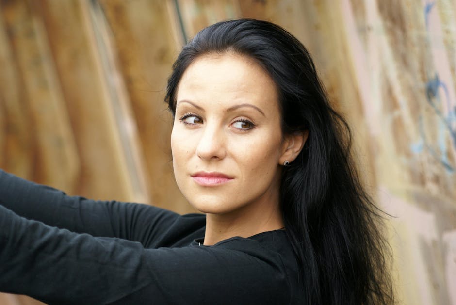 Profile of a person with eyes closed in meditation, serene and calm atmosphere.